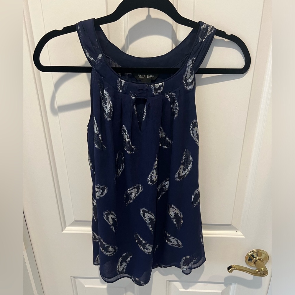 White House Black Market silk tank. Excellent condition. NWOT. Size xs.